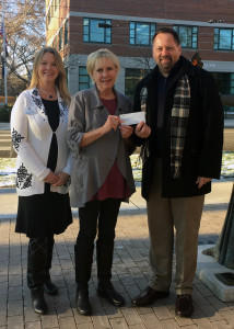 WCA’s Diana Burrell and Bev La Chance accept a check from Nagel Foundation’s Curt Goldgrabe. 